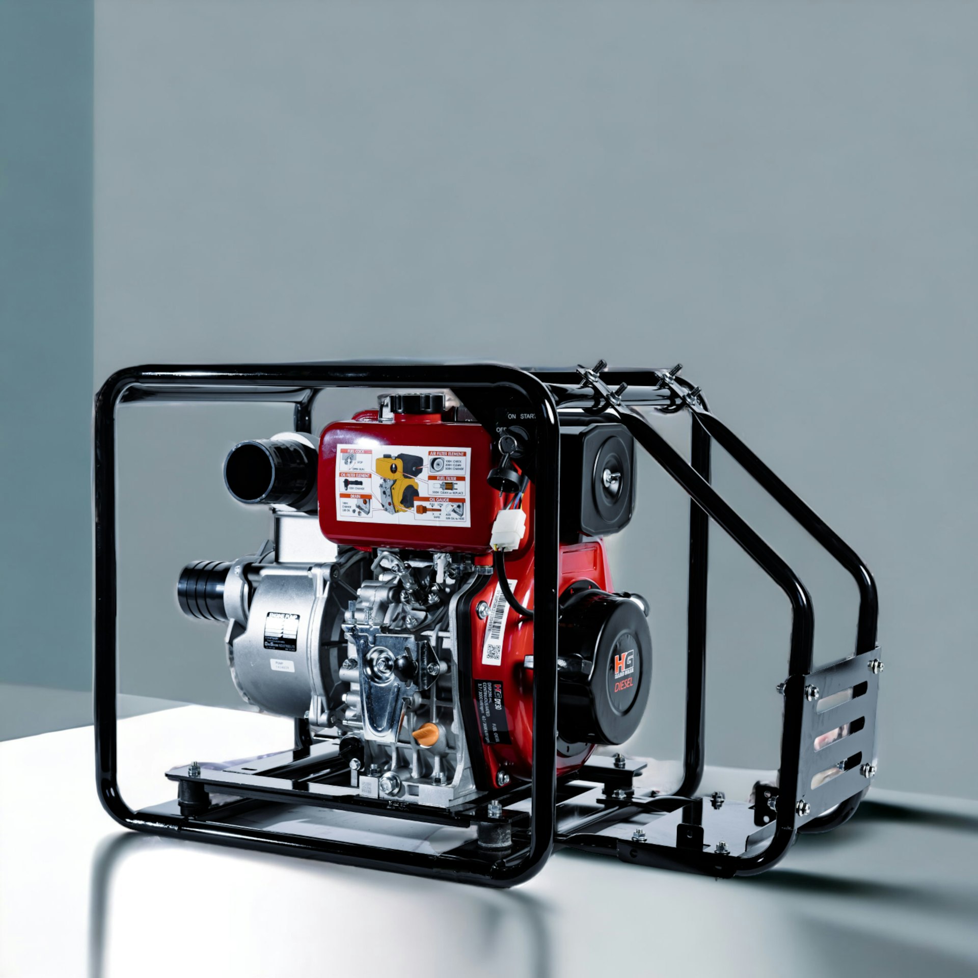 a red and black engine sitting on top of a table
